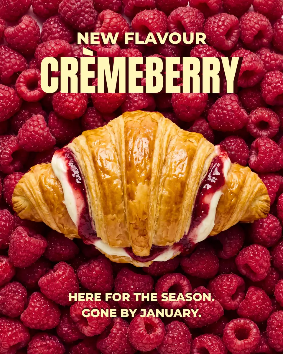 Crèmeberry croissant new flavour promo on a bed of raspberries